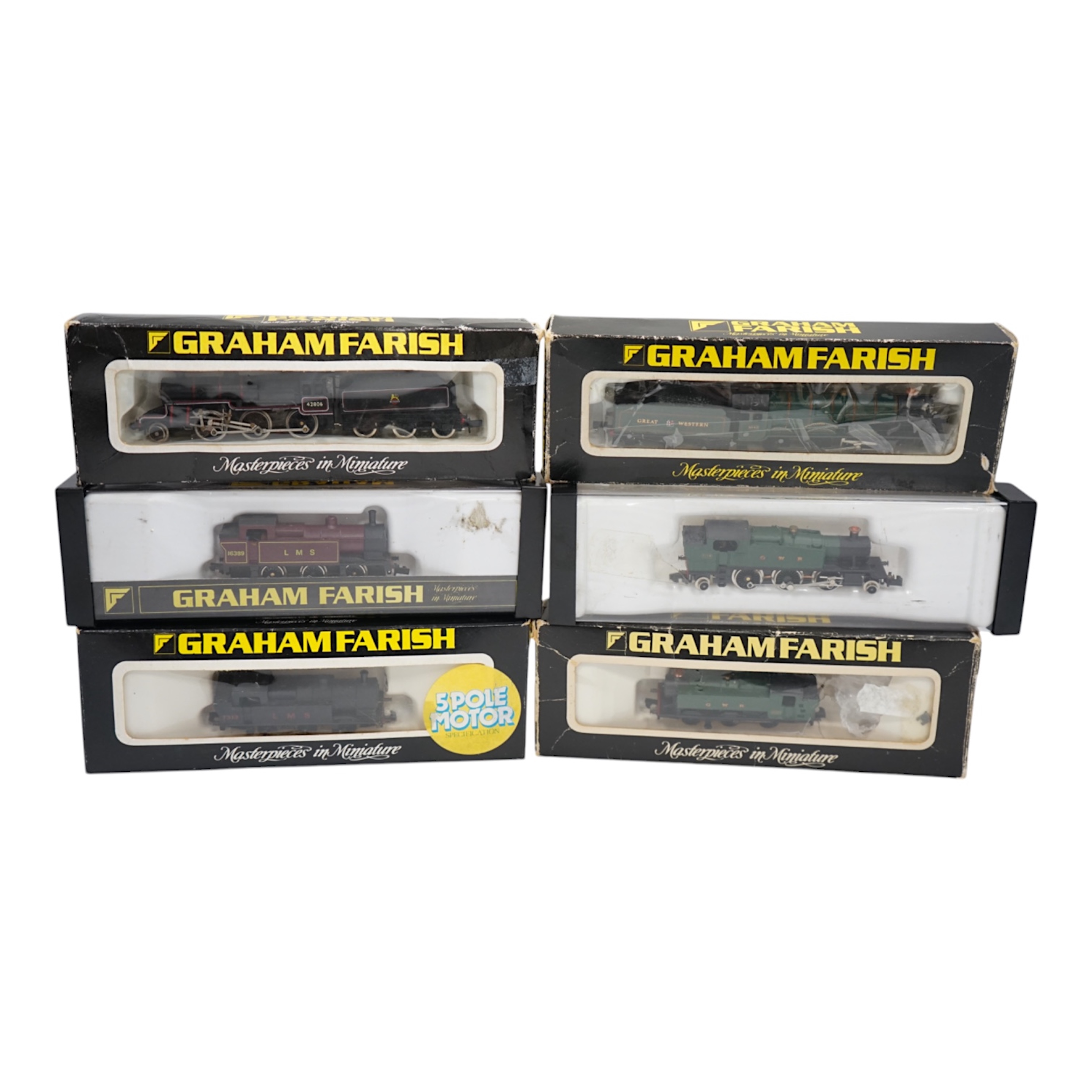 Six boxed Graham Farish N gauge locomotives; a GWR Castle Class, a GWR Prairie Tank, a GWR Pannier Tank, two LMS 0-6-0Ts, and a BR Class 5MT ‘Crab’. Condition - good, some wear to boxes and some locomotives in incorrect